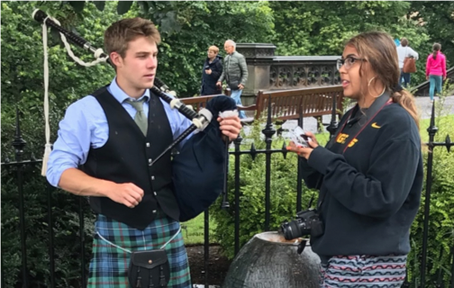 One of my sophomores interviews a performer playing the bag pipes in her first day in Edinburgh, Scotland. 